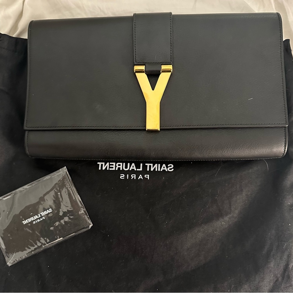Authentic Saint Laurent Chyc Clutch Black Leather.
